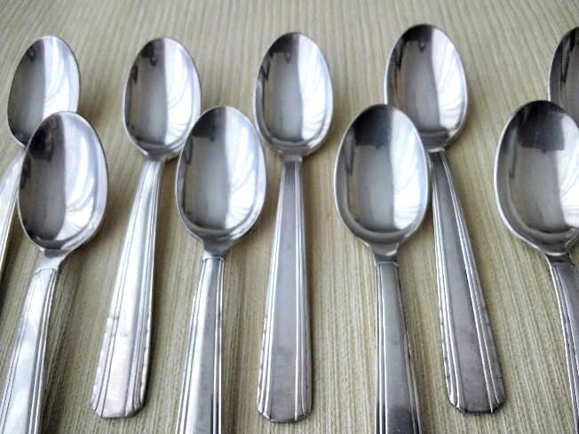 Set of 2 x 6 silver metal spoons 2 different models