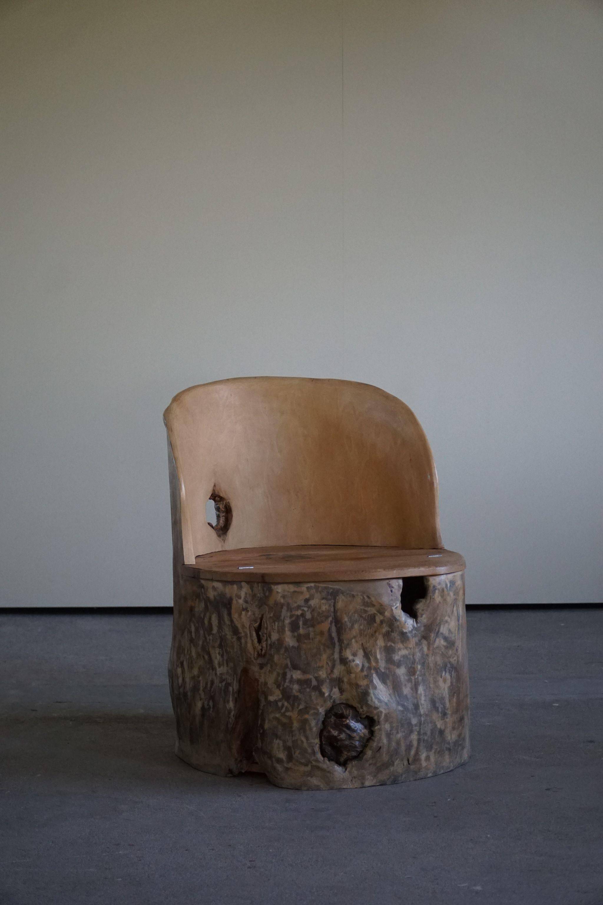 Sculptural Norwegian trunk chair in mid-century brutalist solid wood.