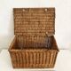 Old wicker basket with closure and handle