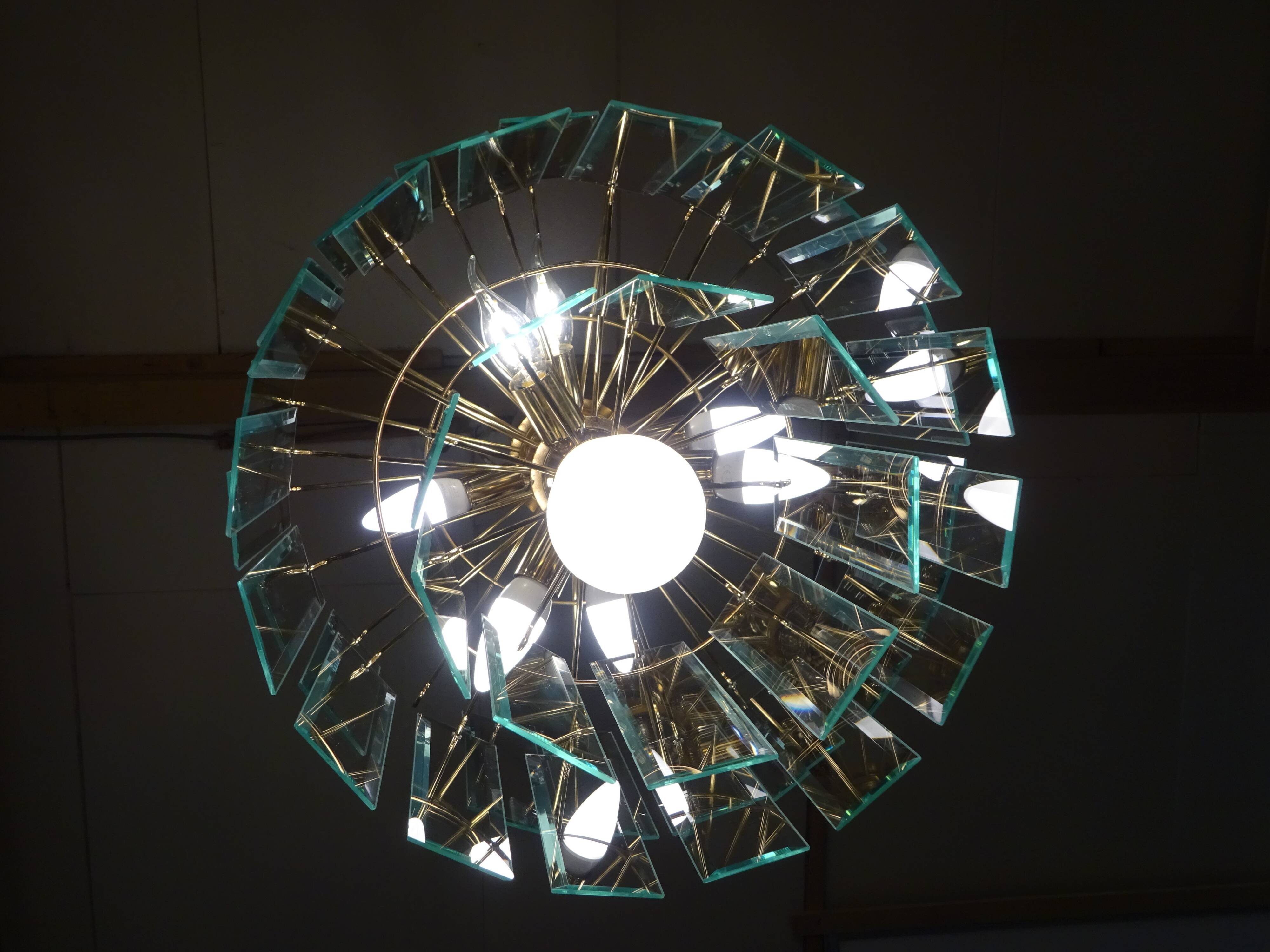 Brass chandelier and beveled glass, Italian manufacturing