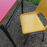 Child desk and vintage schoolboy chair