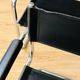 Pair of tubular armchairs in metal and leather Style Marcel Breuer