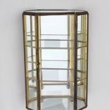 Vintage showcase in brass, glass and mirrors