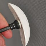 Coat hooks made of galvanized brass and raw white porcelain