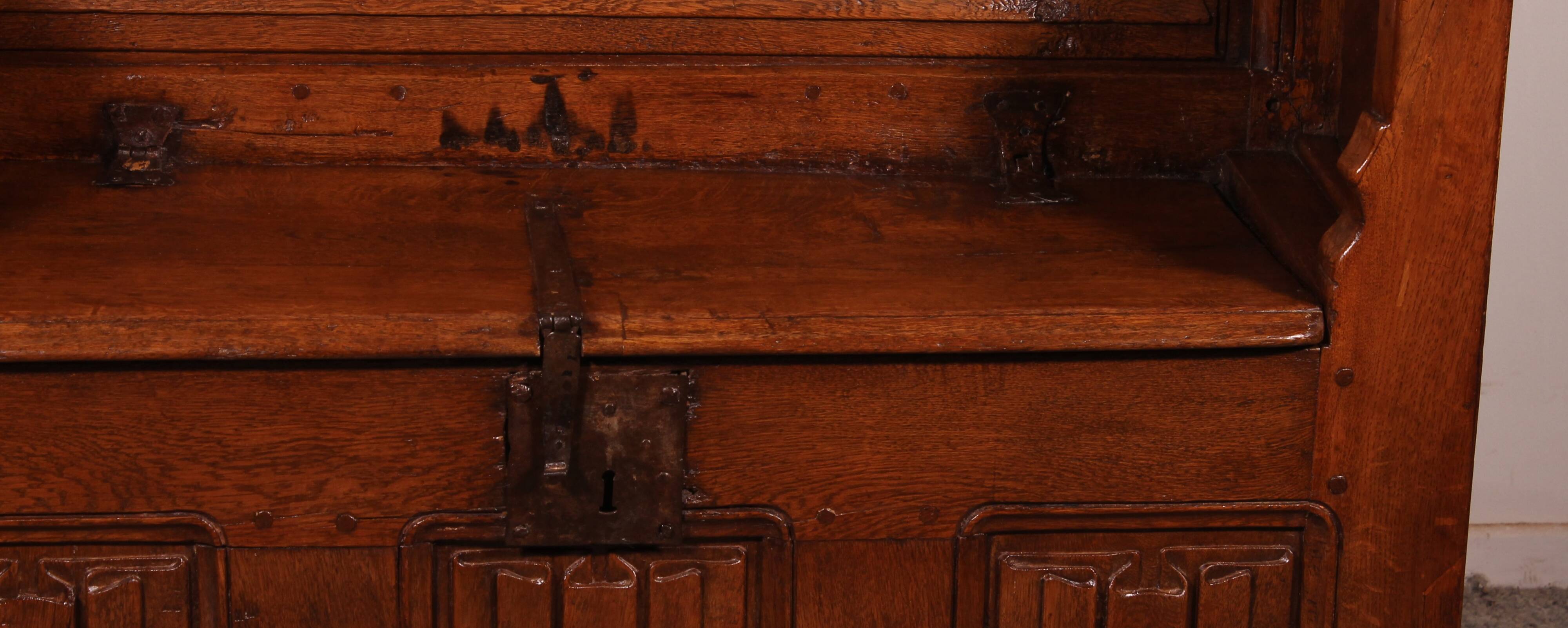 Oak bench chest with incorporated panels and gothic elements