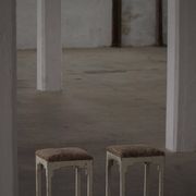 A pair of antique Danish stools, seats in lambswool, late 19th century.