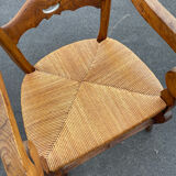 Walnut and straw armchair