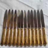 12 Table Knives in Gold Metal
