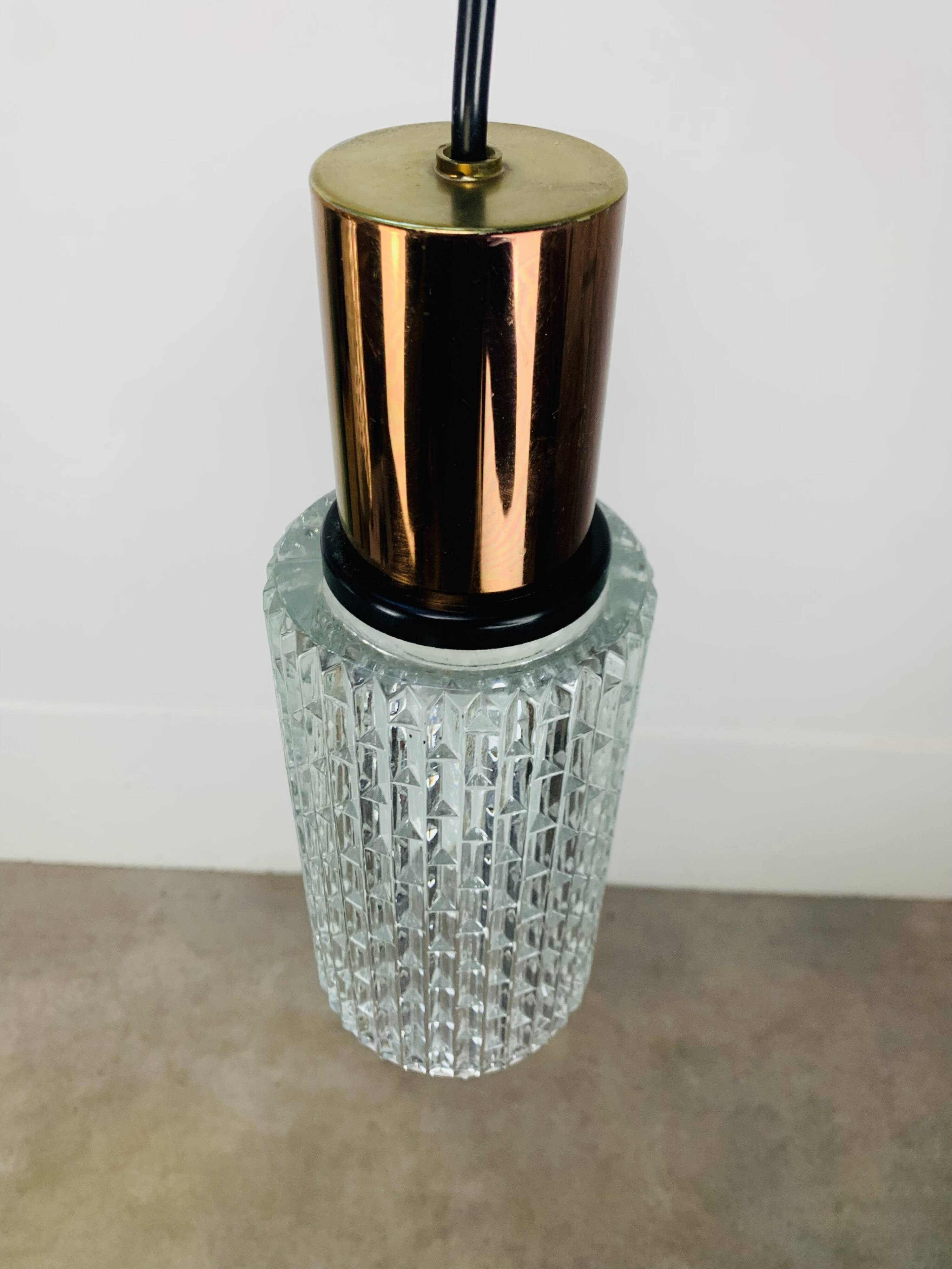 Pair of vintage cut glass pendant lights from the 1970s.