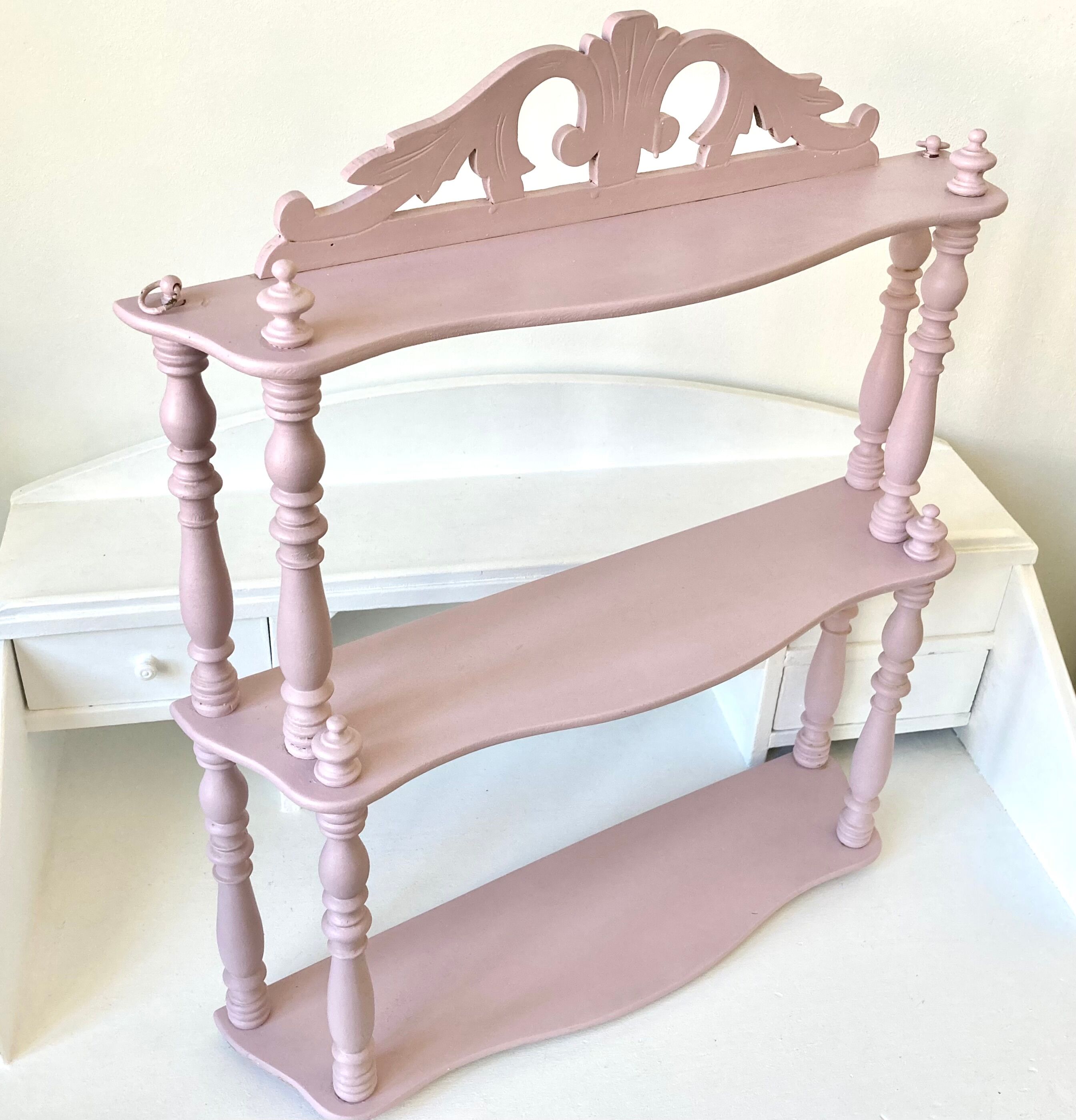 Carved wooden wall shelf