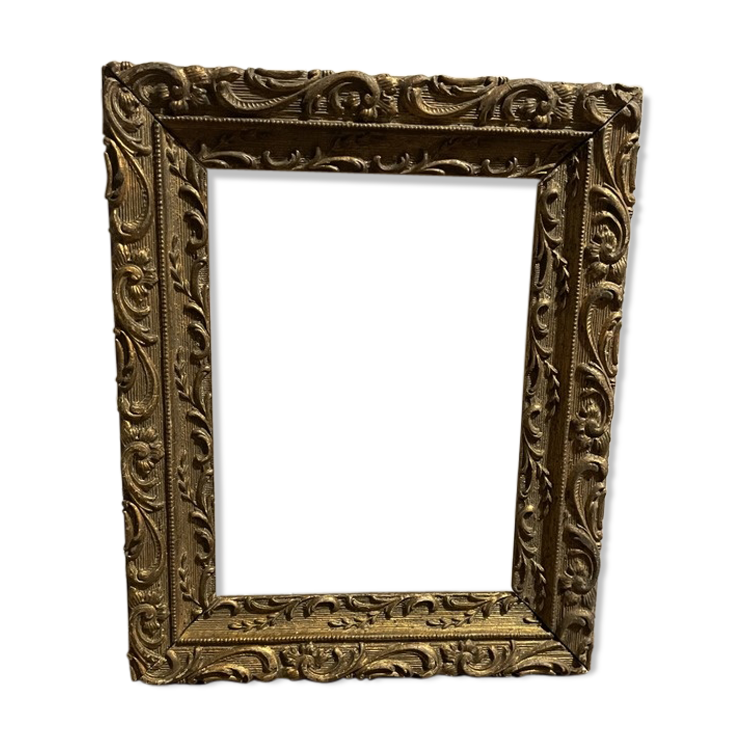 Former wooden frame with gold moulding