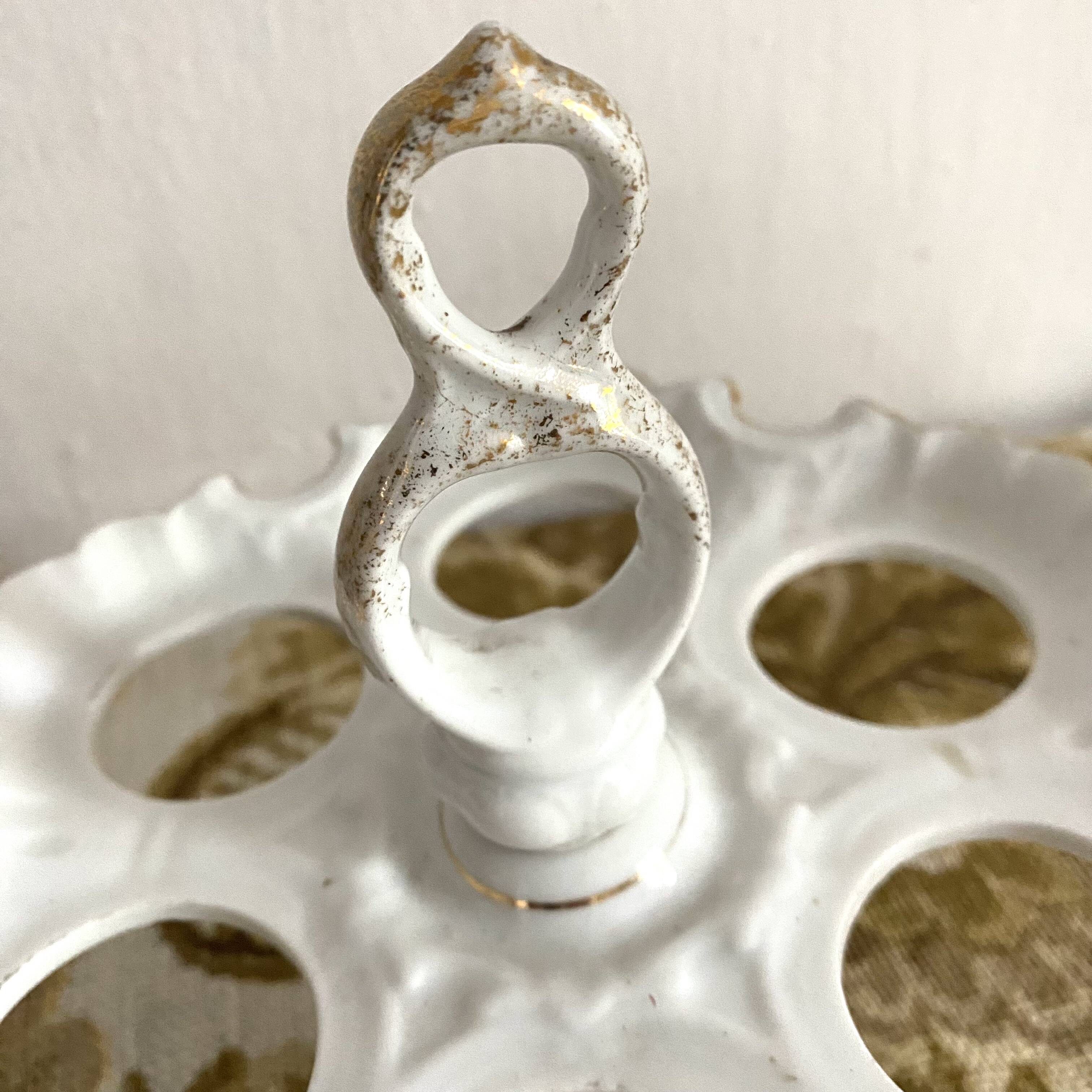 Early 20th century porcelain egg display