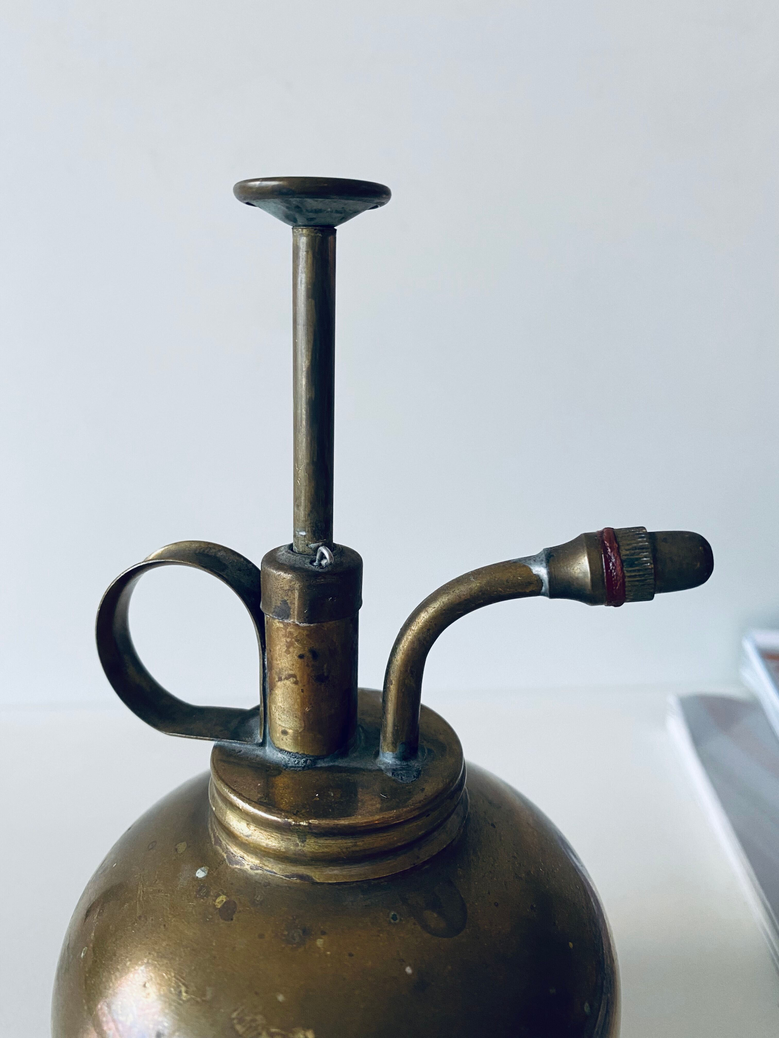Old brass mist for indoor plants