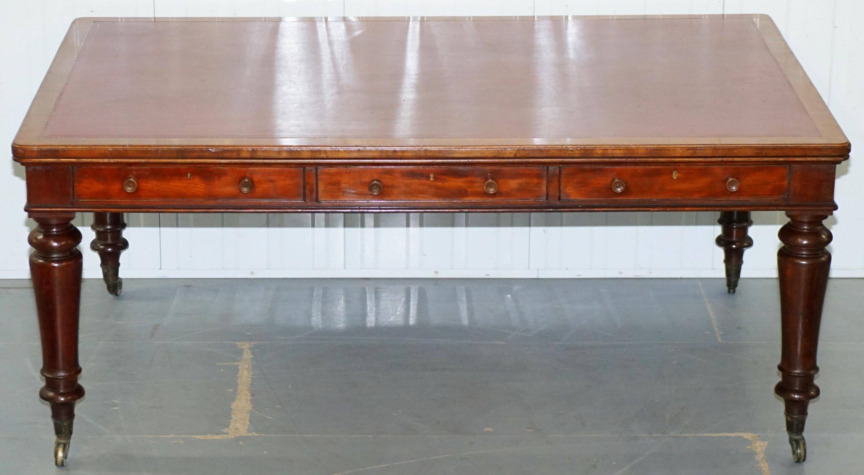 Rare double-sided desk in hardwood by Holland and Sons, Victorian era.