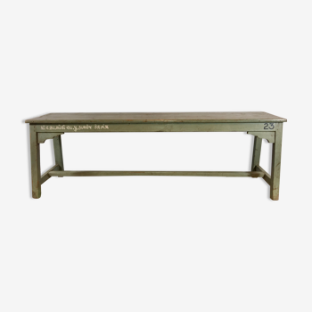 Grey lase wooden bench with inscriptions