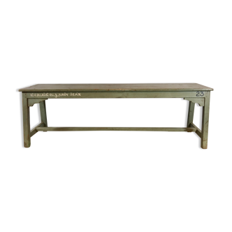 Grey lase wooden bench with inscriptions