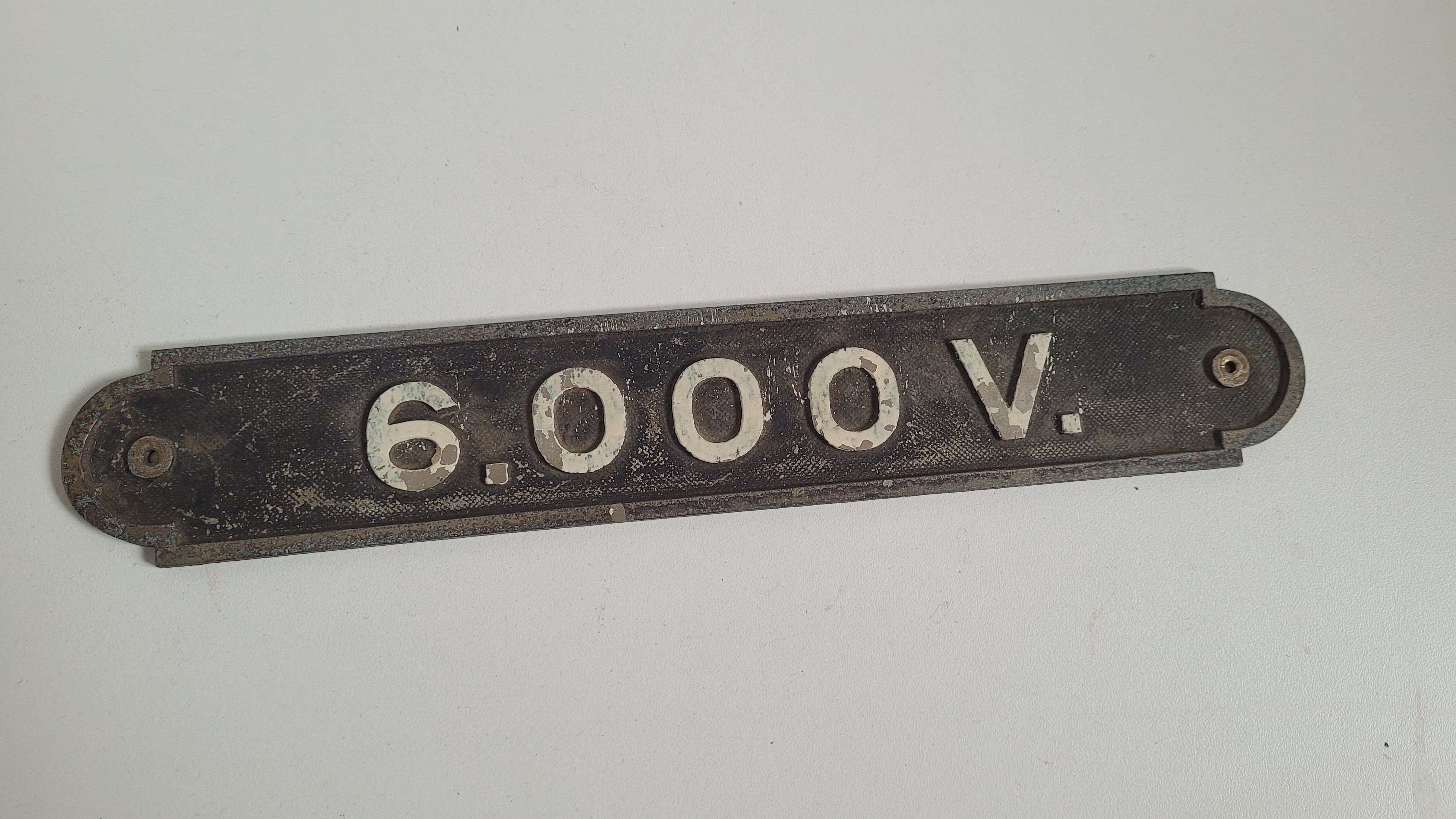 Brass plate 6.000V