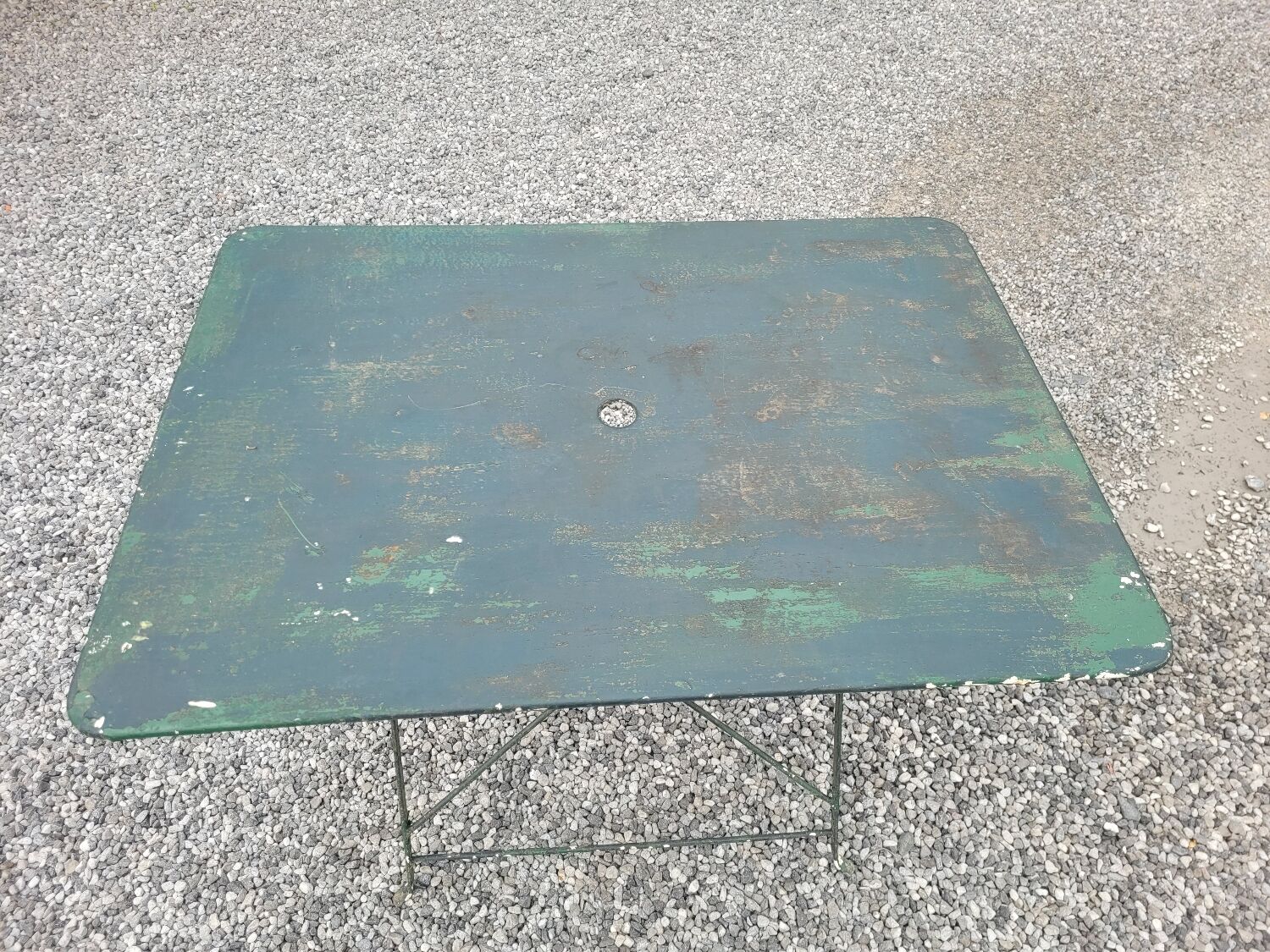 Old folding iron garden table