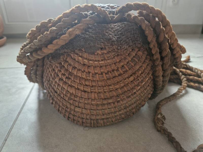 Chokwe Mwana Pwo mask in carved wood with a dark patina and rope hair