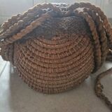 Chokwe Mwana Pwo mask in carved wood with a dark patina and rope hair