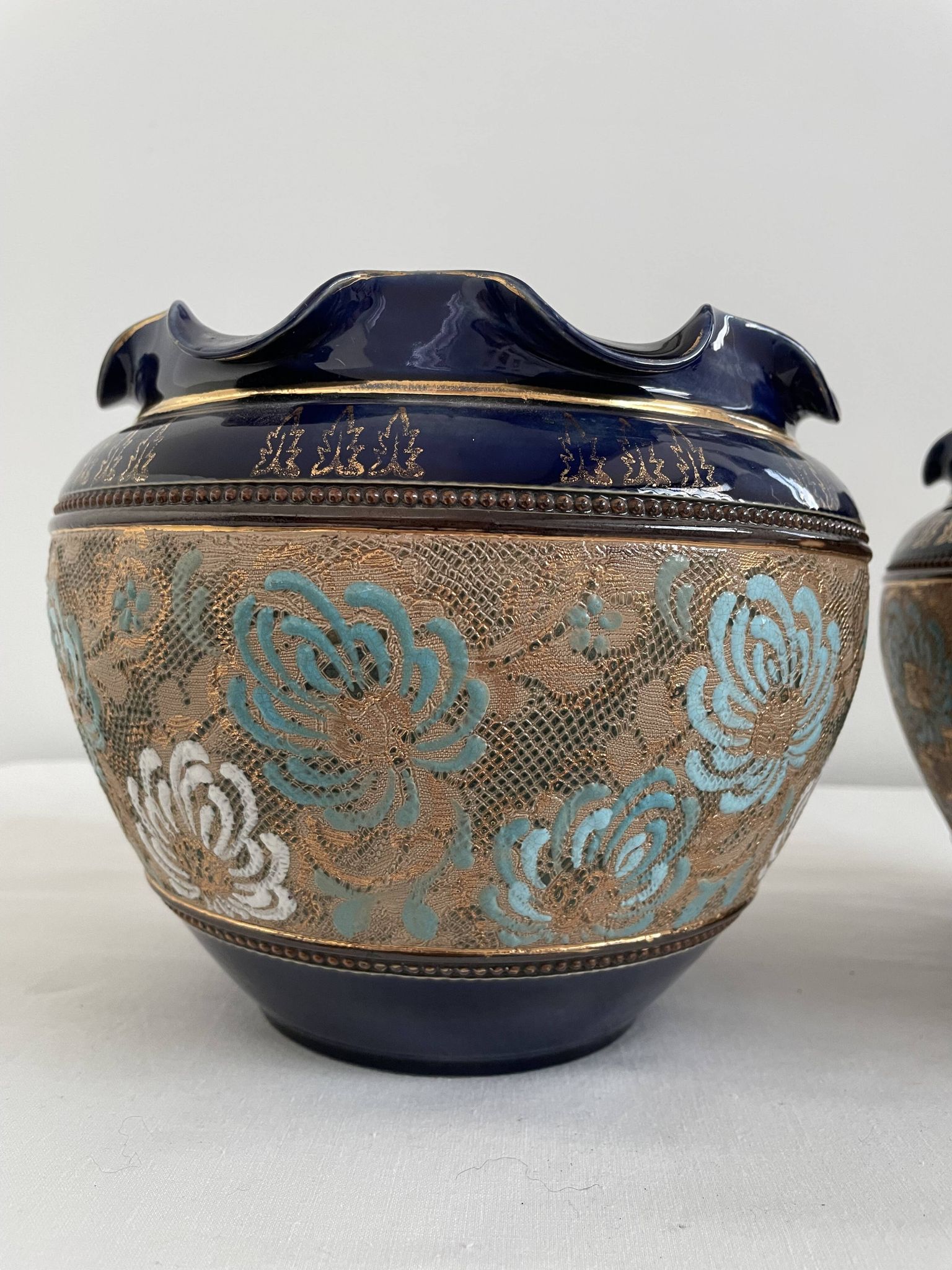 Pair, cache pots, royal doulton, english earthenware, 1920-1930, floral decoration, blue and gold, marks in