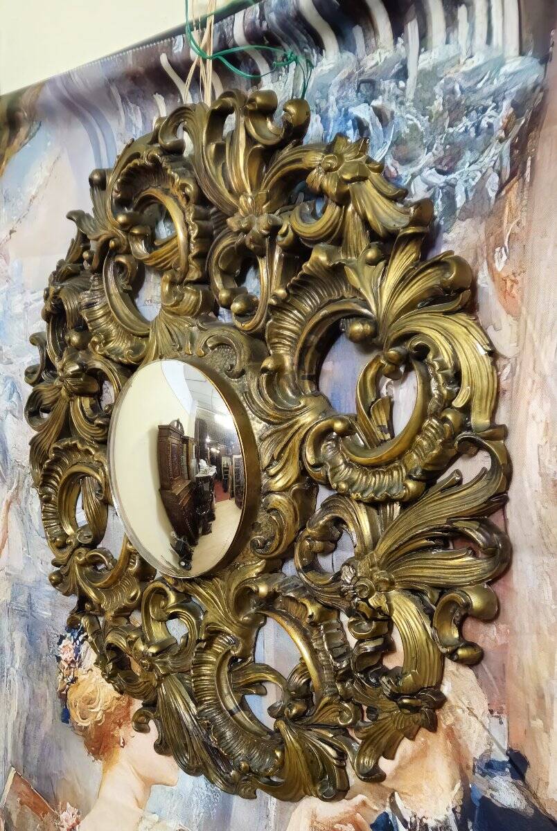 Antique gilded mirror in baroque/rococo style – very richly carved frame