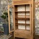Parisian art deco glass cabinet in raw wood