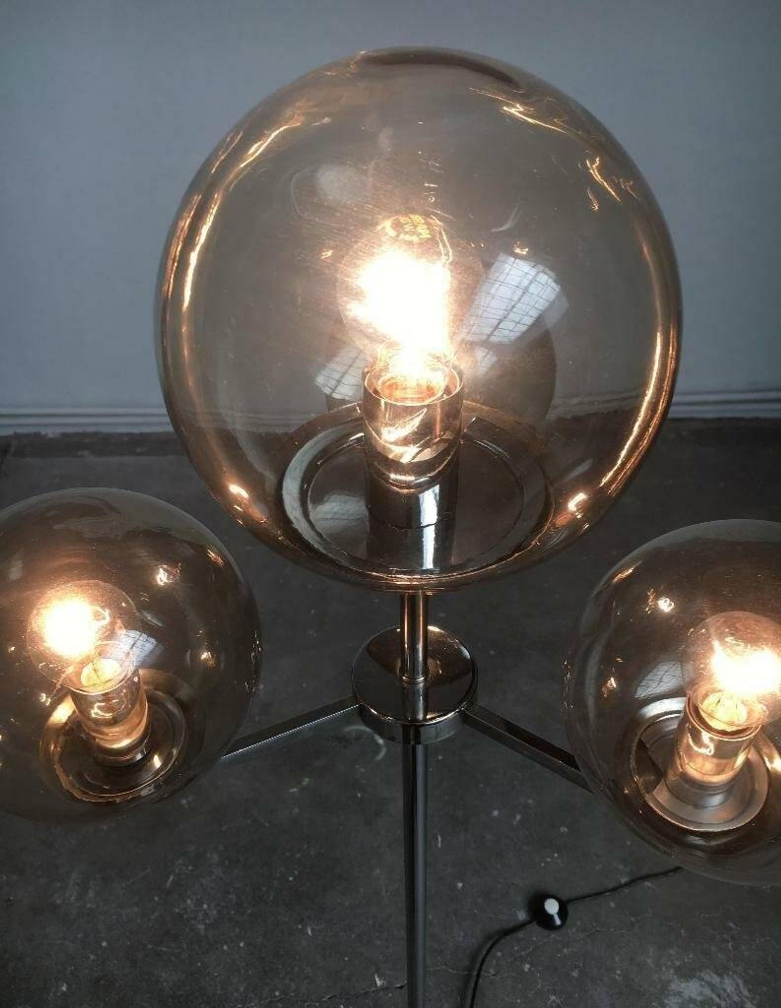 Chrome and glass floor lamp in mid-century German space style by Hustadt Leuchten, 1960s.