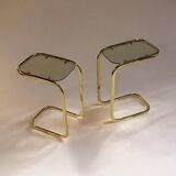 C. 1970 - Pair of side tables in gilded metal and smoked glass -