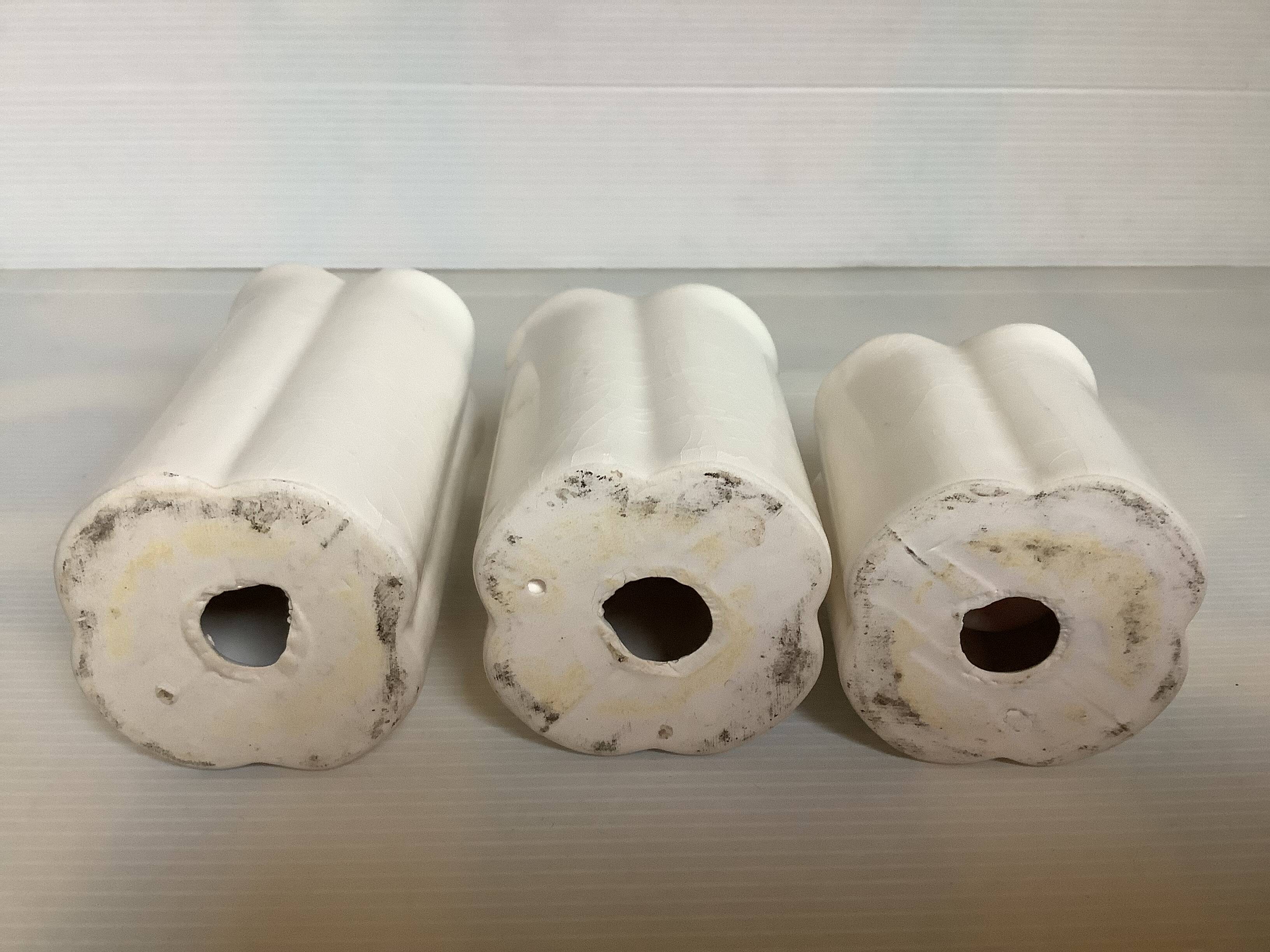 Trio of four-leaf clover candle holders