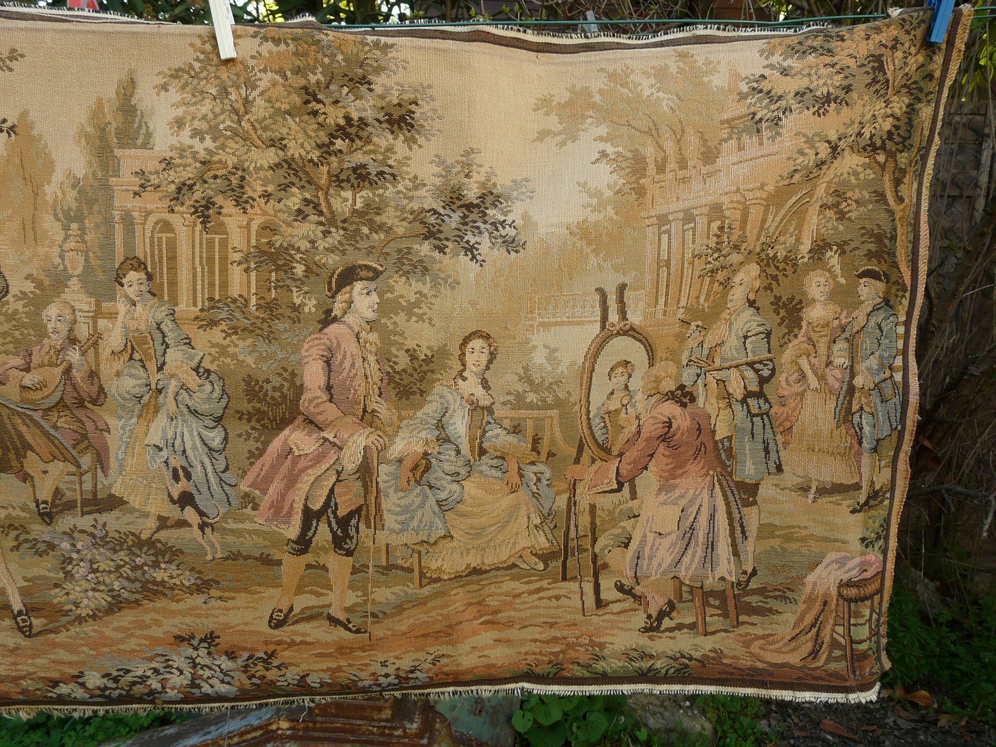 Tapestry wall hanging depicting a gallant scene from the mid-century.