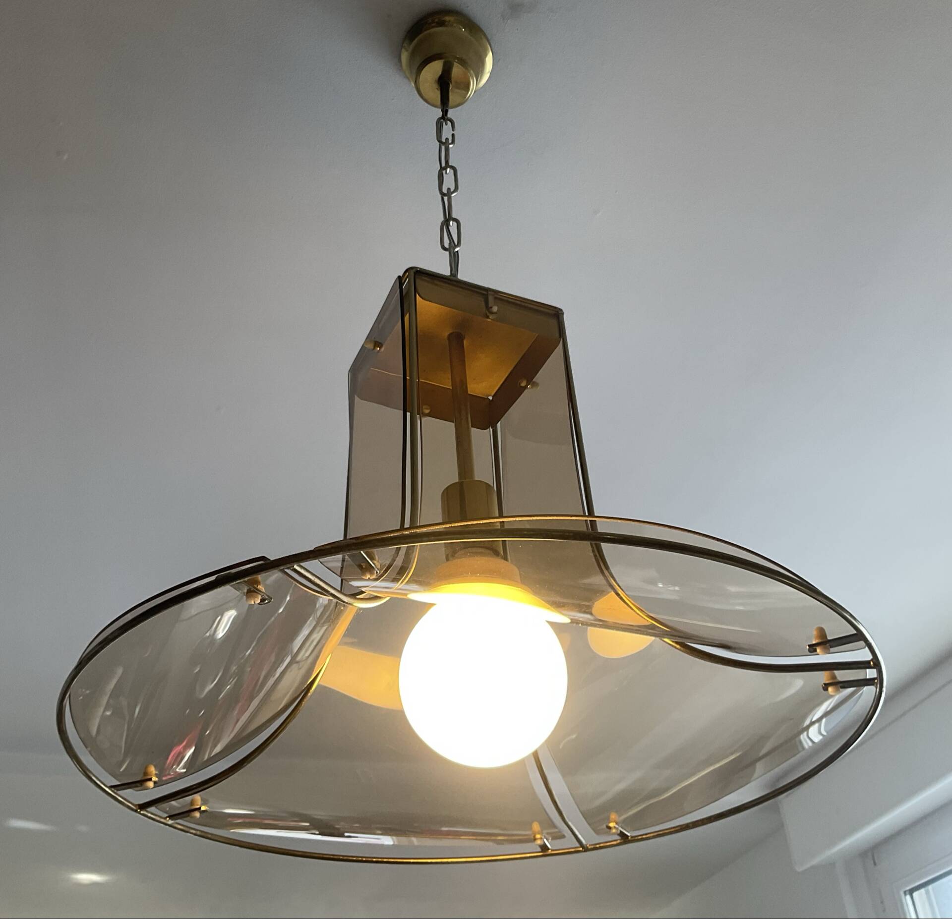 Italian suspension lamp in smoked glass and brass from the 1970s.
