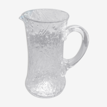 Pitcher made of transparent glass