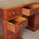 Antique mahogany desk with leather and bronze writing pad, 20th century.