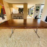 Desk that can serve as a dining table.