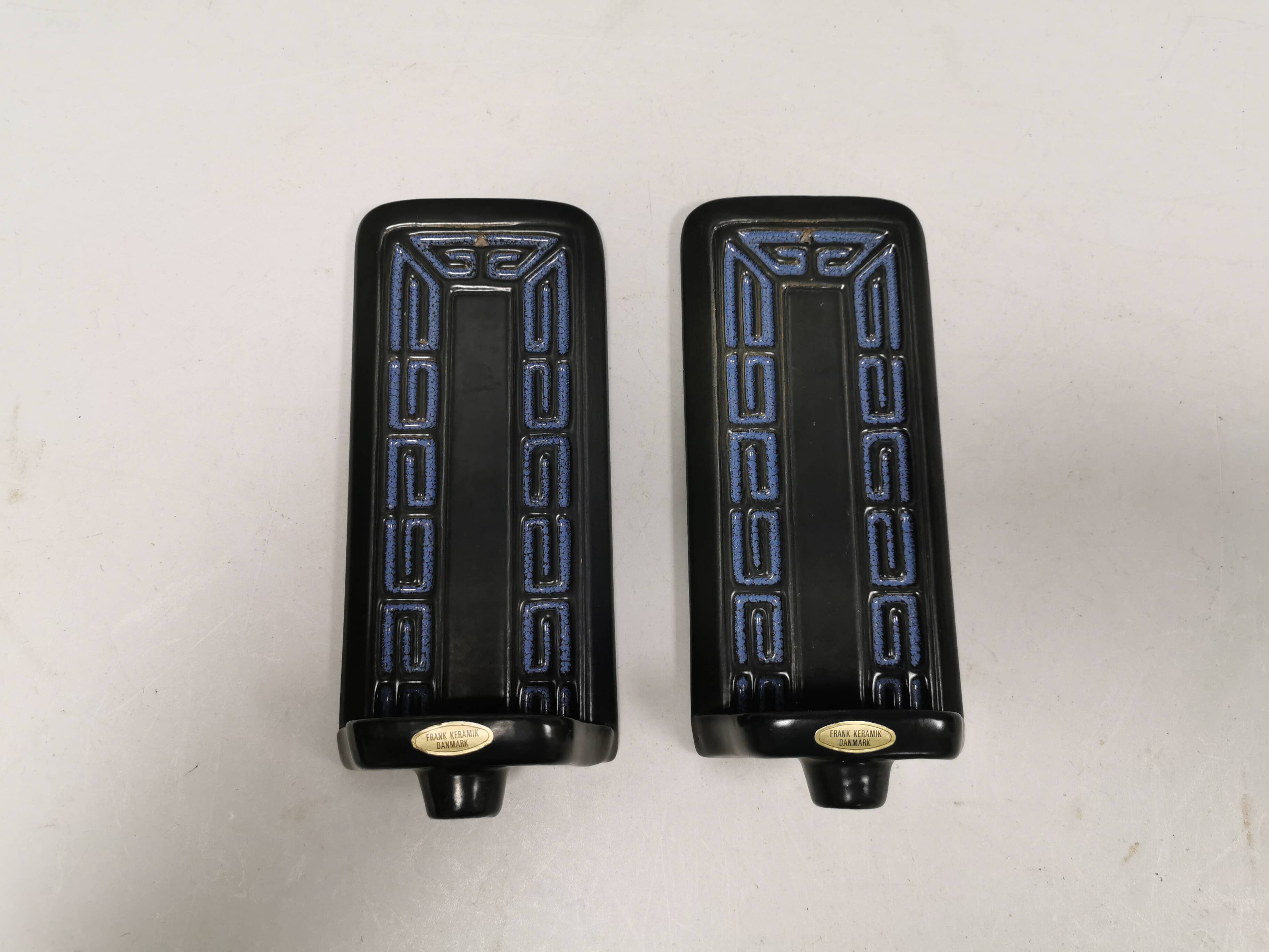 Two wall-mounted candlesticks by Danish Frank Ceramics 1970s.