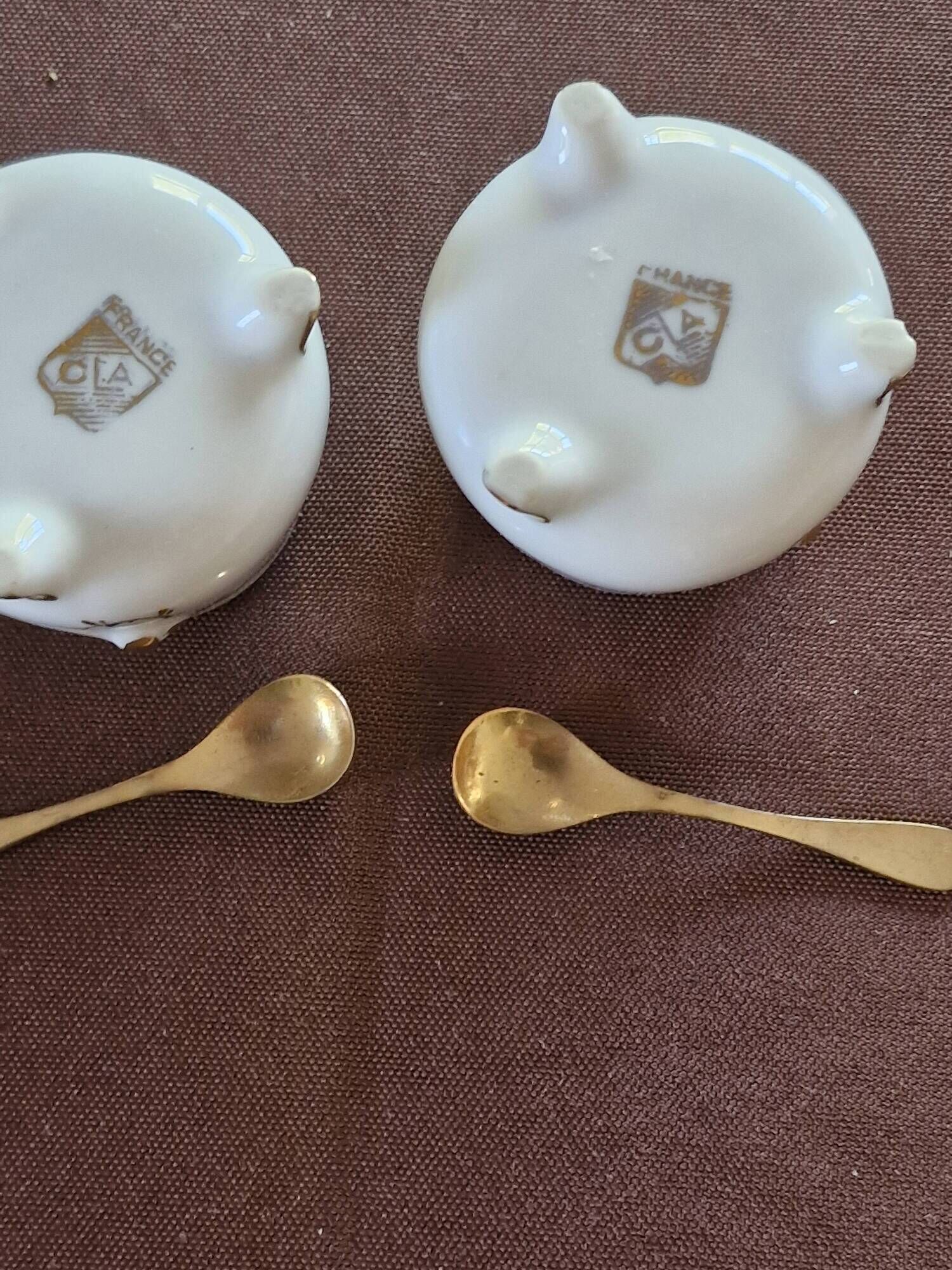 Vintage porcelain salt and pepper shakers.