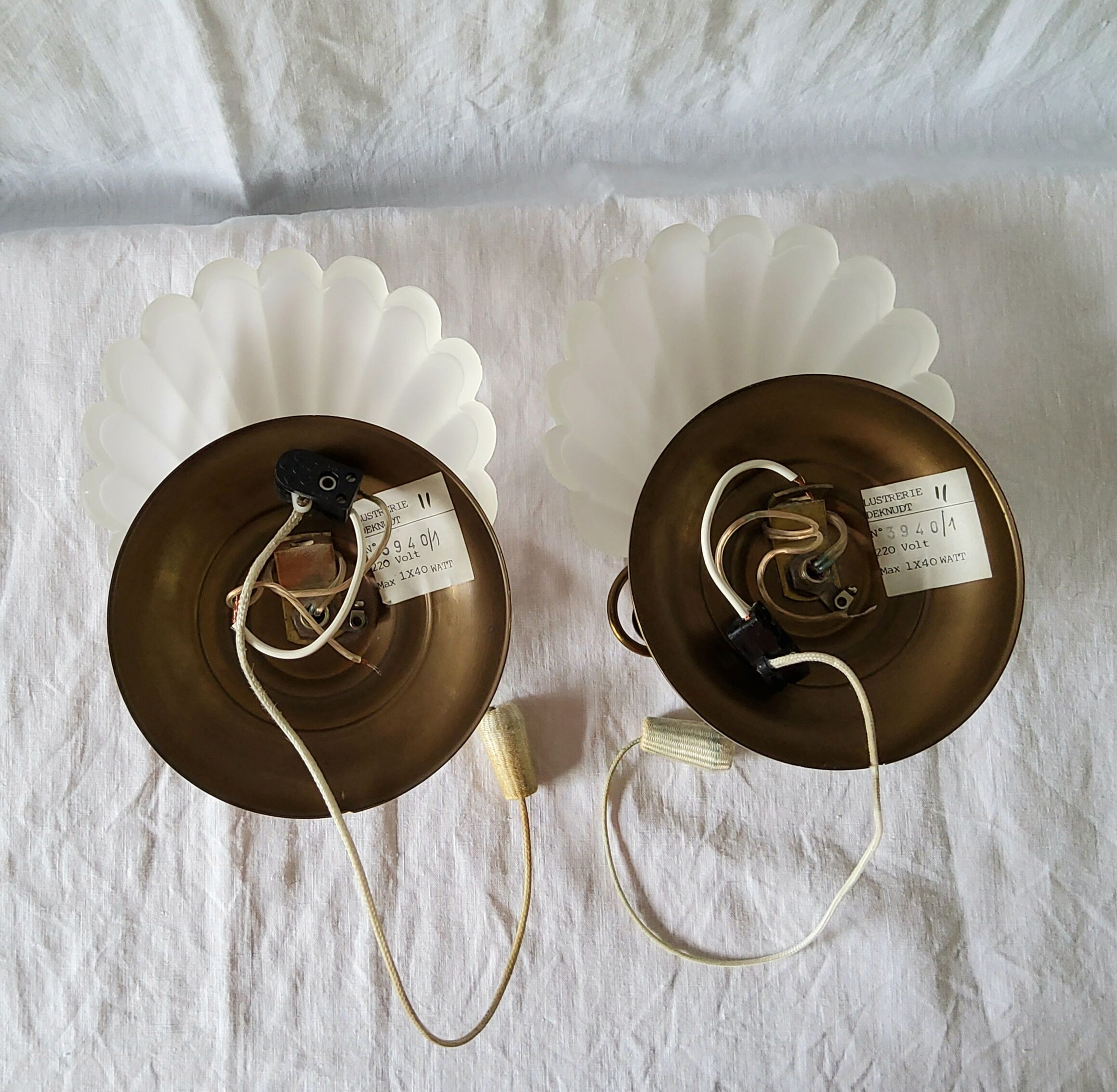 Pair of Deknudt shell sconces