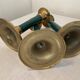 Trio of vintage bronze candle holders