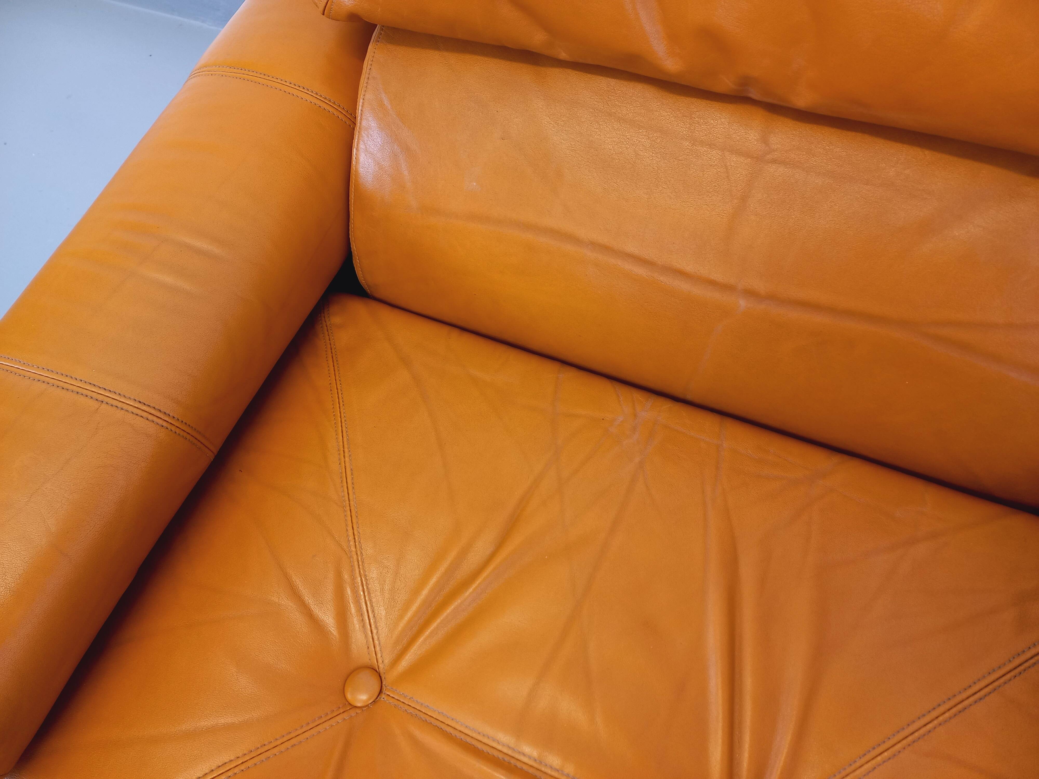 Pair of vintage leather lounge chairs from the 60s and 70s