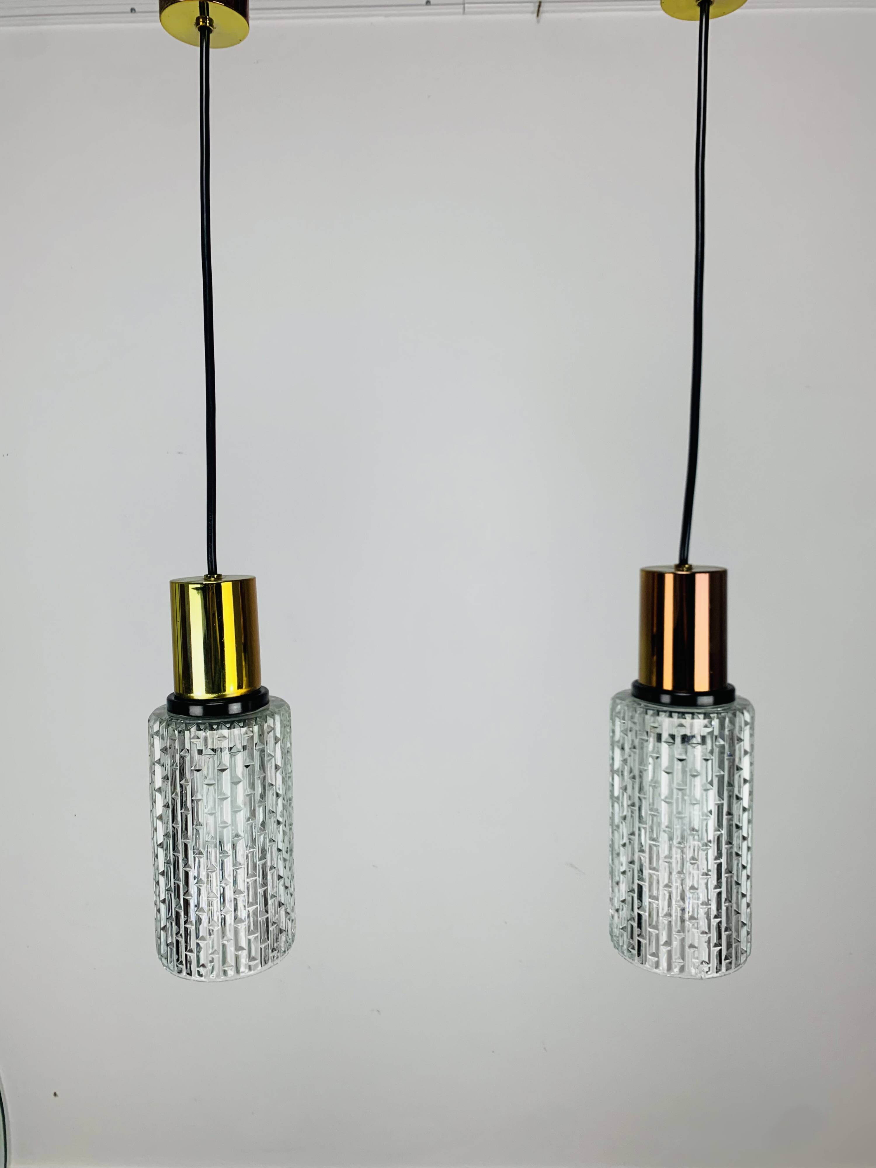 Pair of vintage cut glass pendant lights from the 1970s.