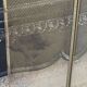 Vintage English fire screen in brass and gilded metal.