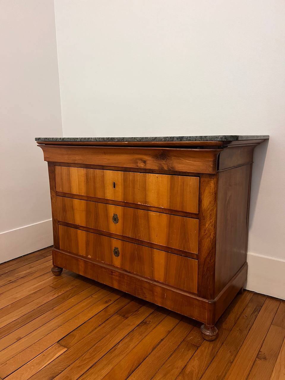 19th-century commode with a marble top