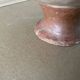 Antique terracotta cup