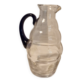 Carafe en verre à corps ondulé & anse bleue