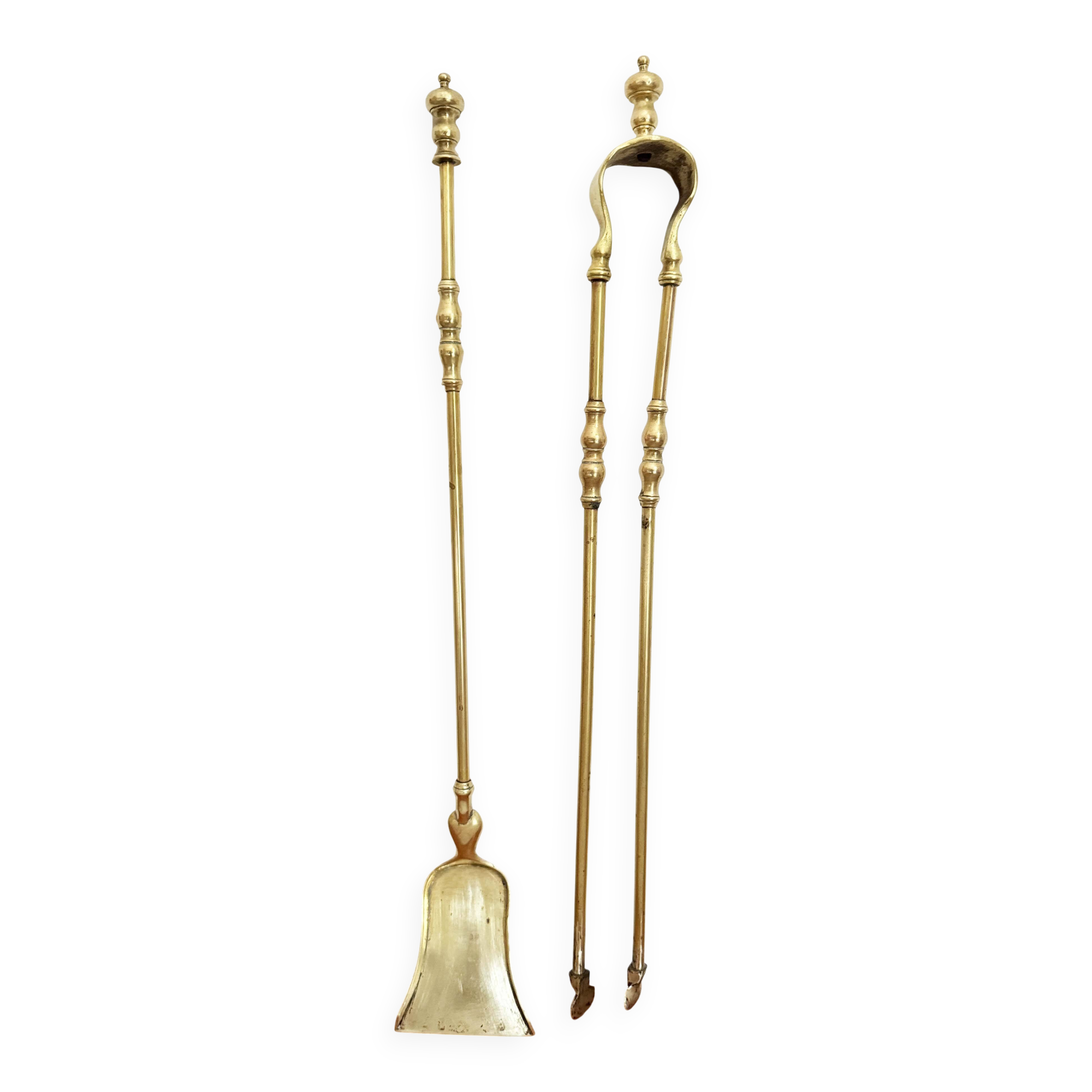 19th-century brass fireplace tongs and shovel.