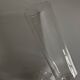 Pair of crystal champagne flutes with a button foot, 1960.