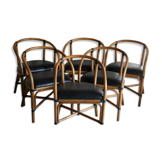 Leather and rattan faux armchairs