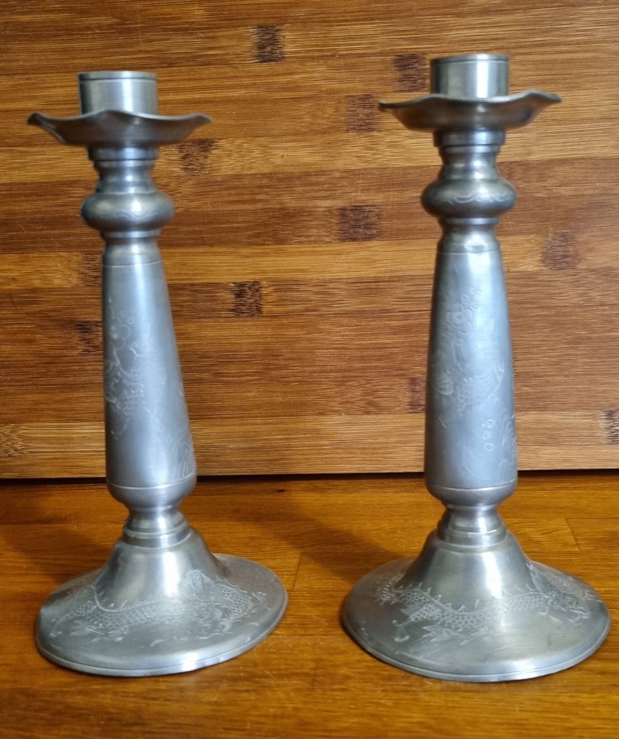 Pair of old Chinese candlesticks in engraved pewter