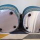 Pair of Crapaud armchairs and a vintage blue velvet pouf